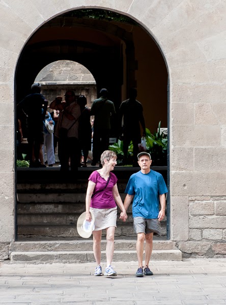 A couple strolls through the Old City during one of our Barcelona Experince day walking tours.