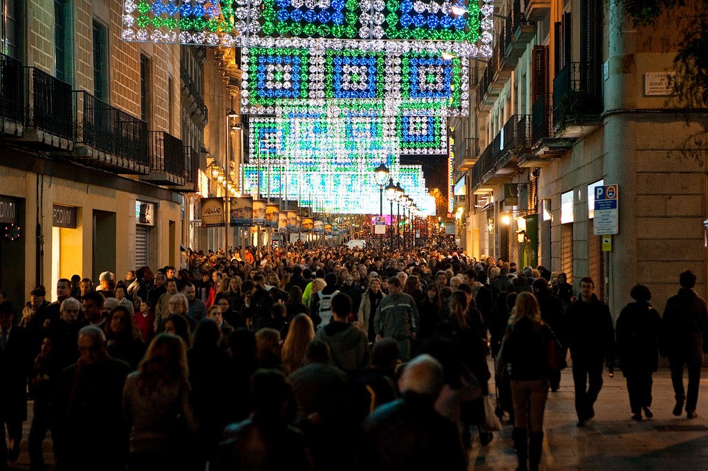 Barceloneses do their Christmas shopping downtown, creating big but festive crowds.