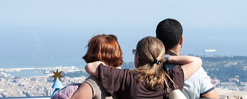 An image of clients looking out over the city of Barcelona.