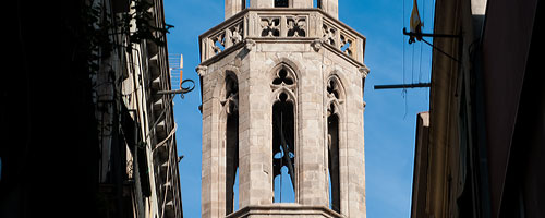 Sightseeing Barcelona, Santa Maria del Mar Church: an image of a section of the bell tower of the santa maria del mar church.