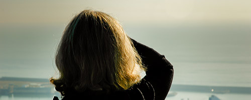 A client enjoys the view of the city during her private barcelona shore excursion.